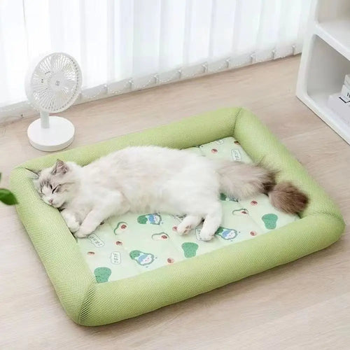 Square cooling pet bed with waterproof fabric, raised edge, and anti‑slip base for cats and dogs.